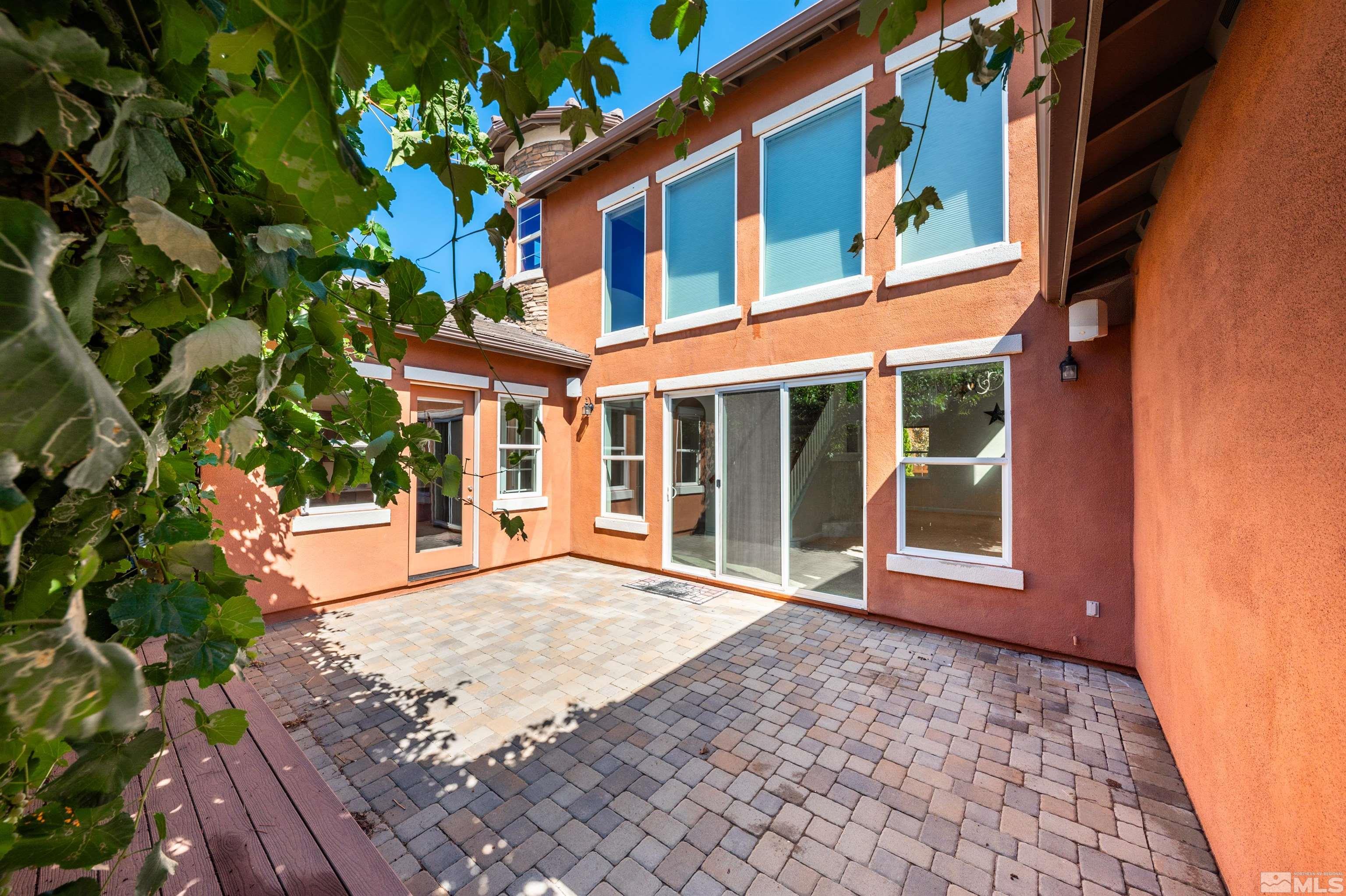 985 Bella Monte Drive Minden, NV 89423 - Photo 20 of 37 a view of a building with a garden