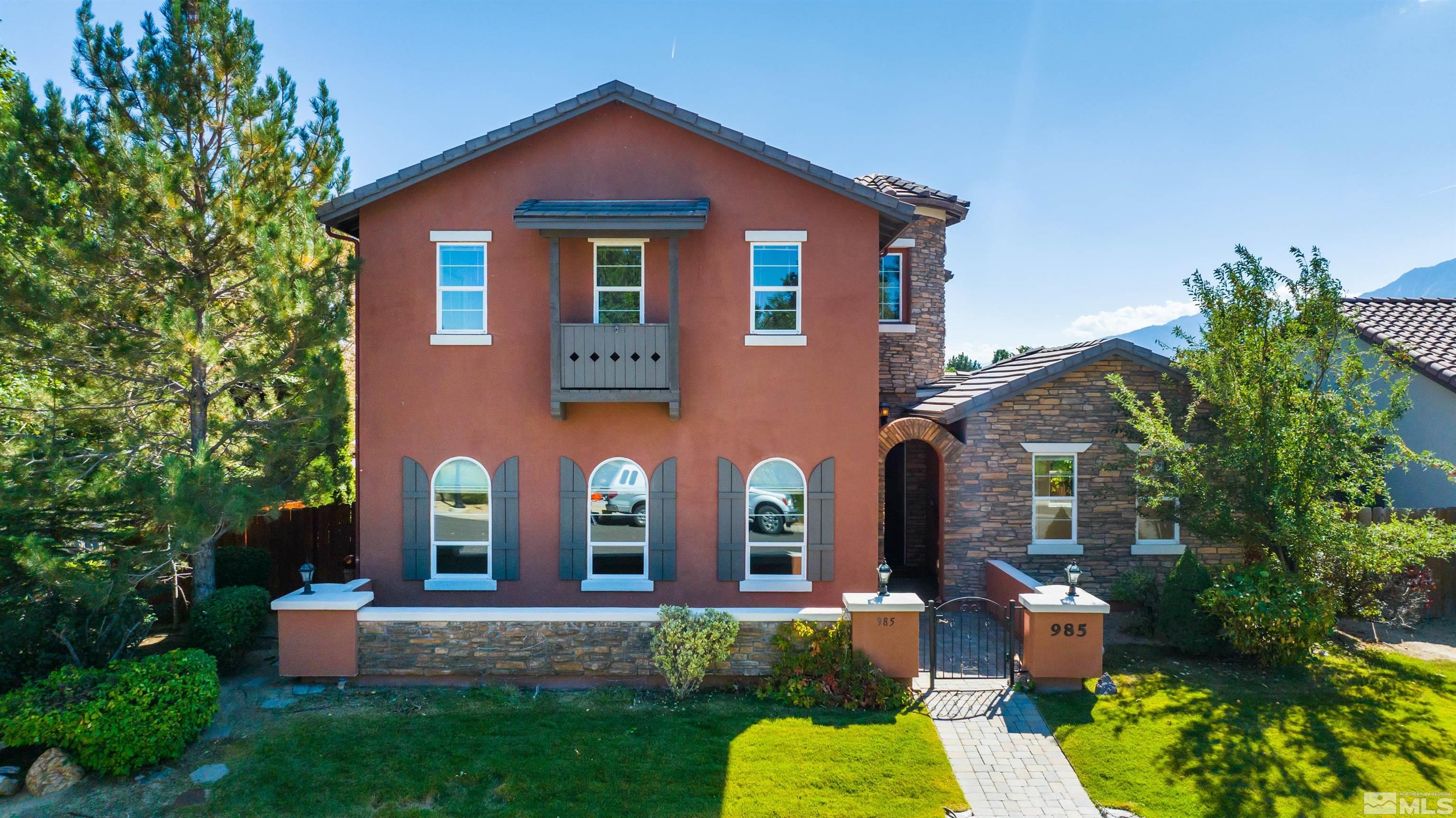 985 Bella Monte Drive Minden, NV 89423 - Photo 2 of 37 front view of a house with a yard