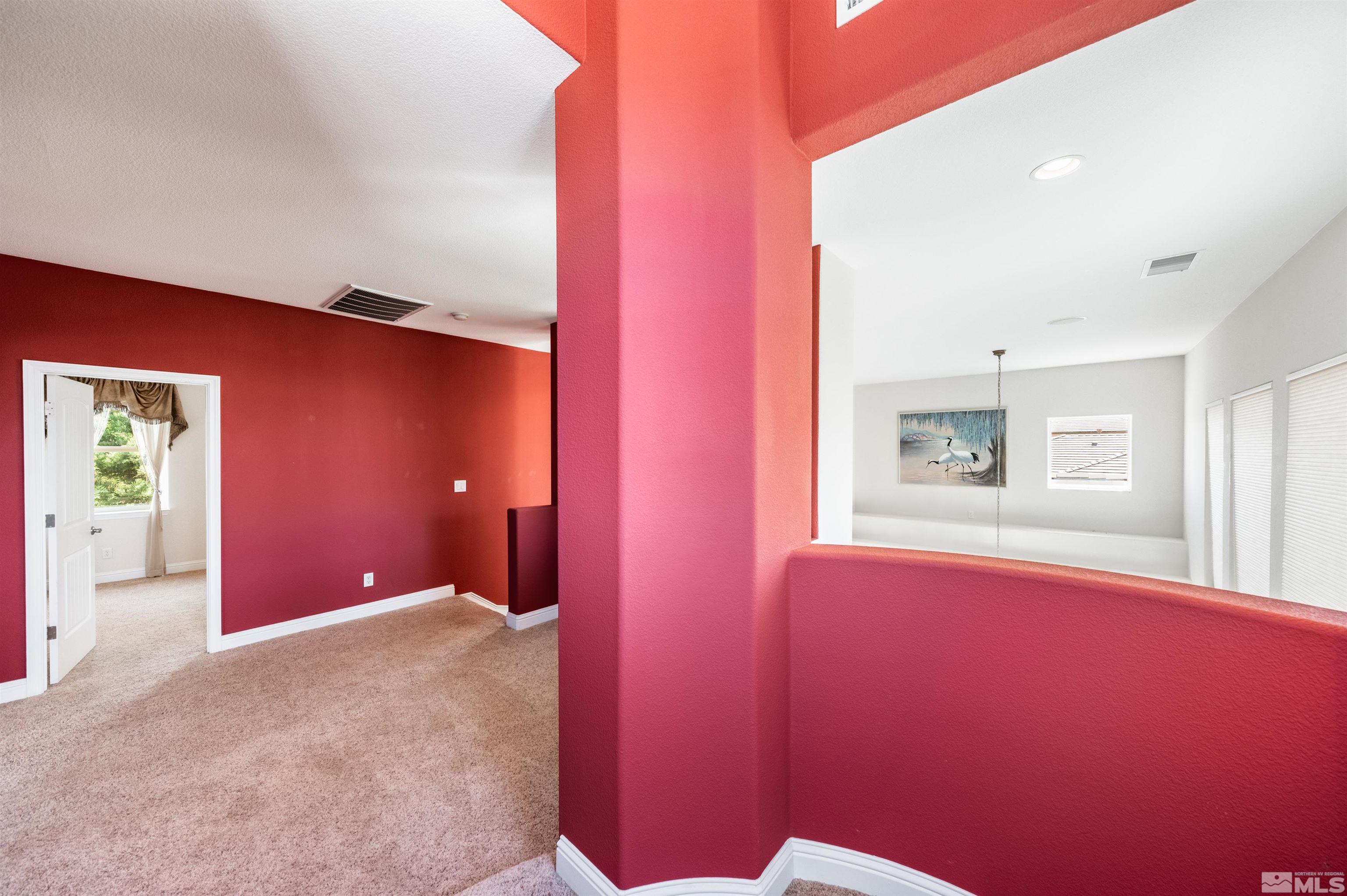 985 Bella Monte Drive Minden, NV 89423 - Photo 23 of 37 a view of a livingroom with an empty space and windows
