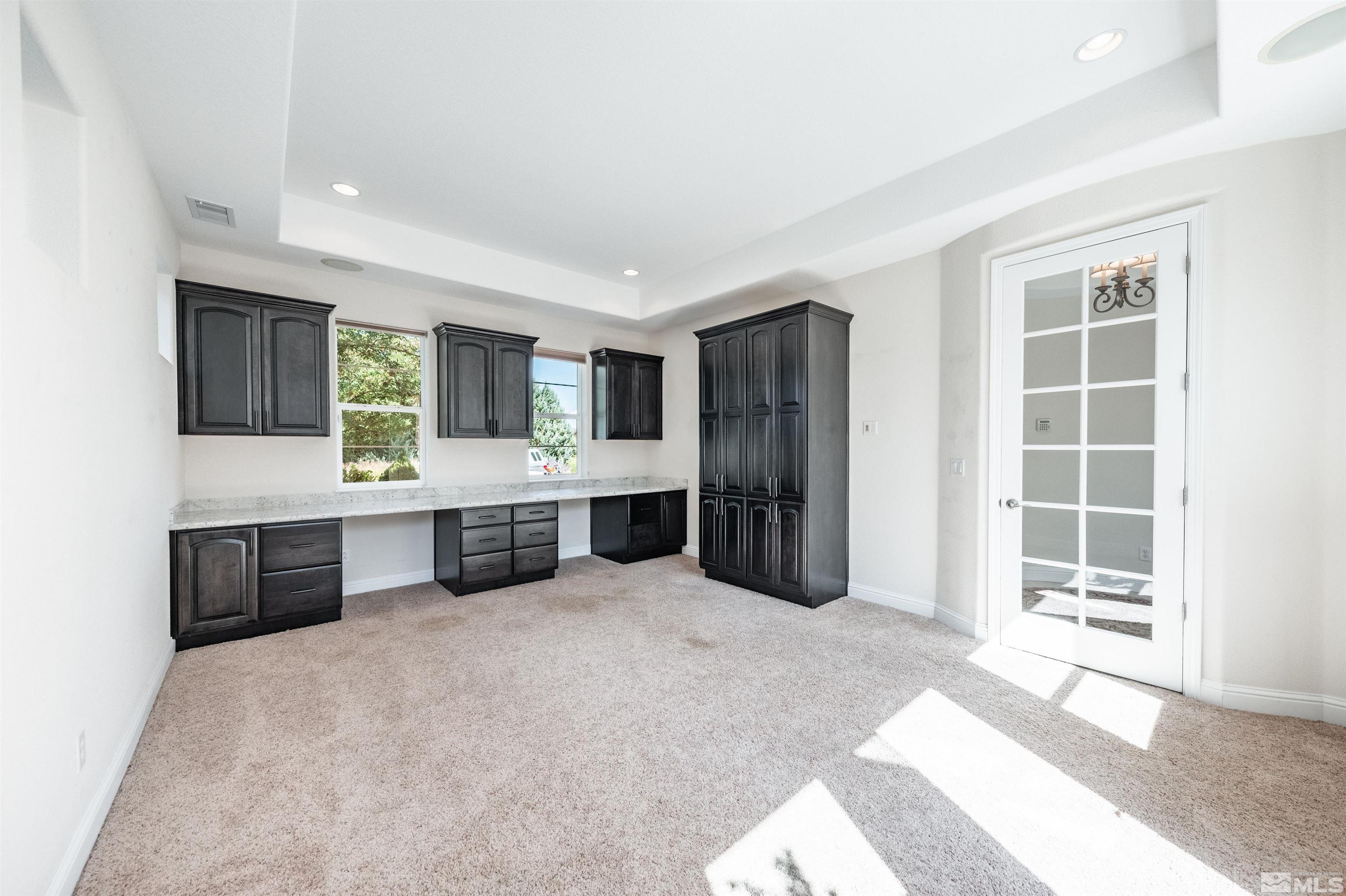985 Bella Monte Drive Minden, NV 89423 - Photo 27 of 37 a large en suite bathroom with a tub double sink and mirror