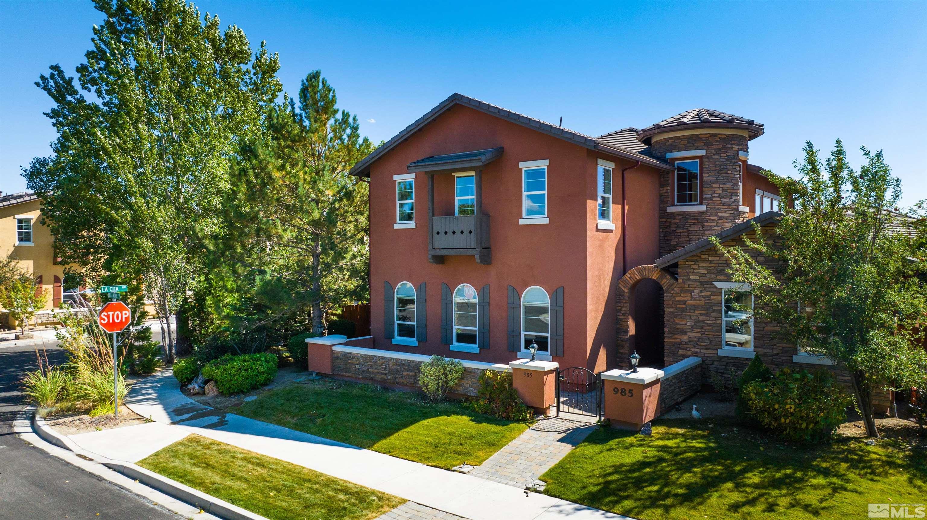 985 Bella Monte Drive Minden, NV 89423 - Photo 31 of 37 a front view of a house with garden