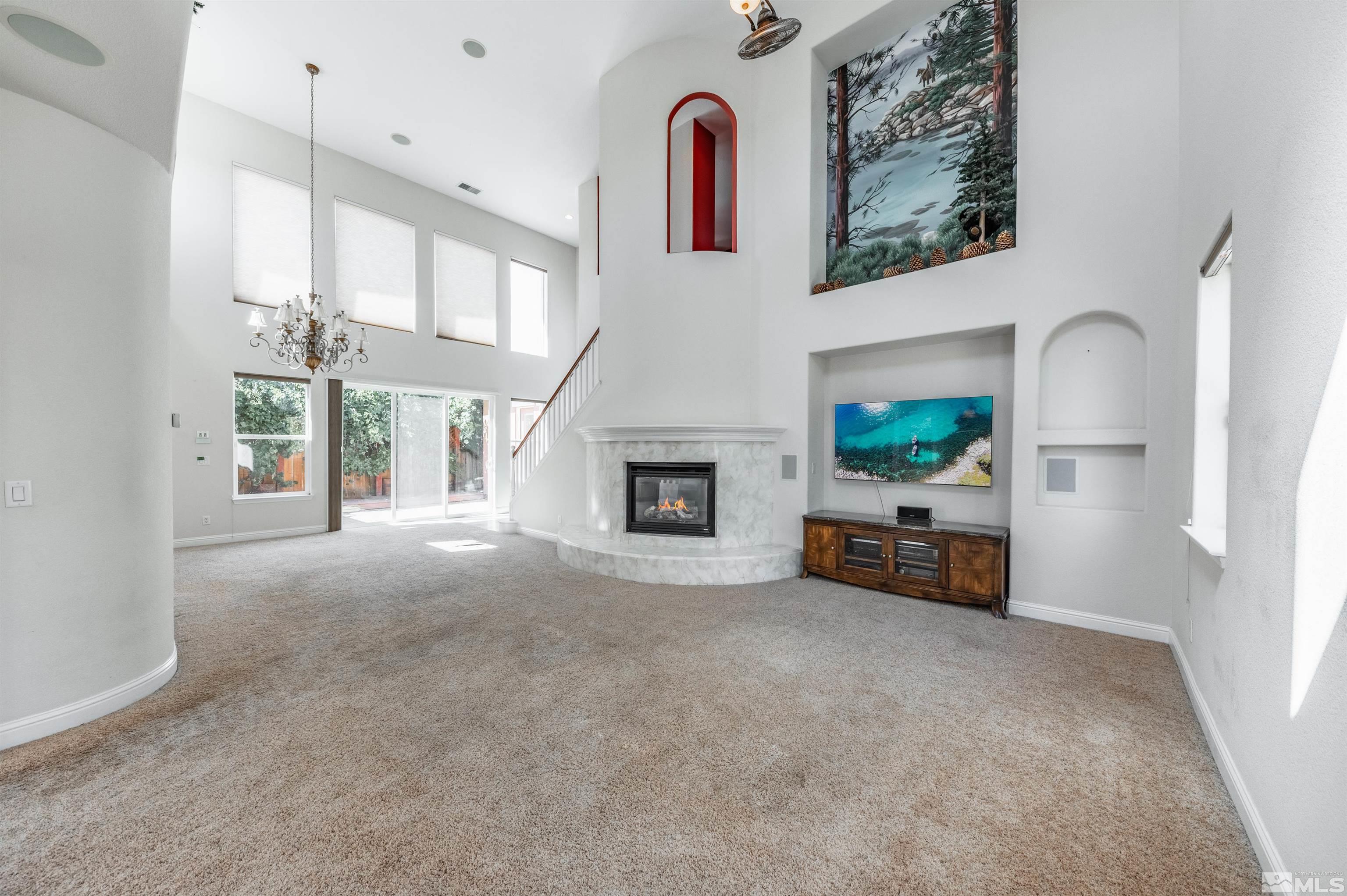 985 Bella Monte Drive Minden, NV 89423 - Photo 9 of 37 a view of livingroom with furniture and a fireplace
