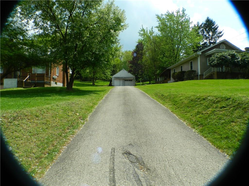 822-828 Hulton Road Verona, PA 15147 - Photo 21 of 22 Driveway splits the properties but 828 has separate drive so there's no need to share.
