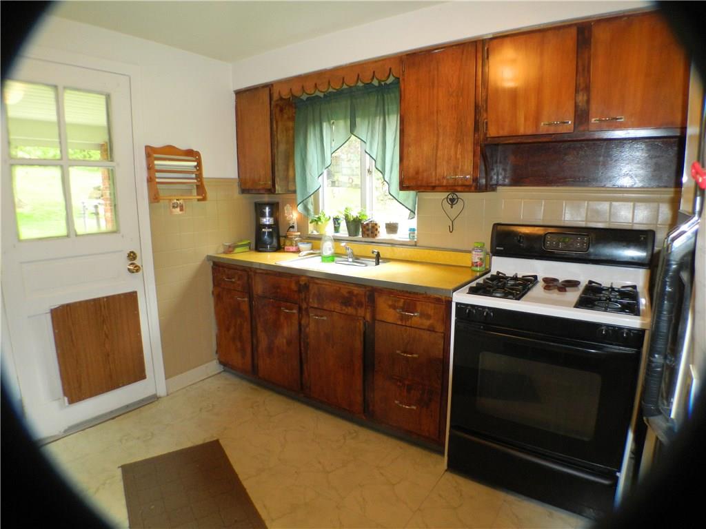 822-828 Hulton Road Verona, PA 15147 - Photo 5 of 22 828 Hulton Road - lots of natural light in this kitchen