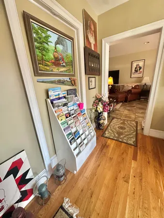 a living room with furniture and a rug
