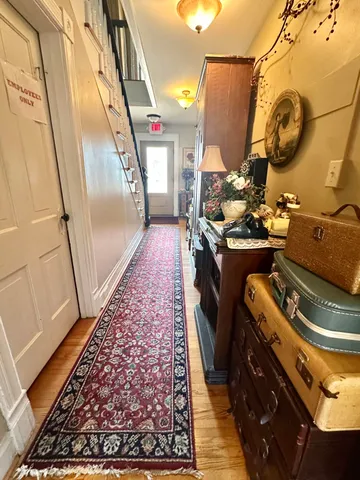a view of a houses with a lush green forest