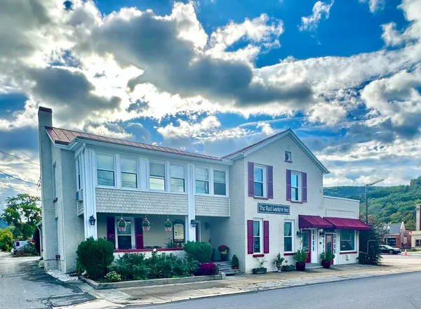 a view of a entryway with flower pots