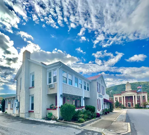 a room with furniture and flowers