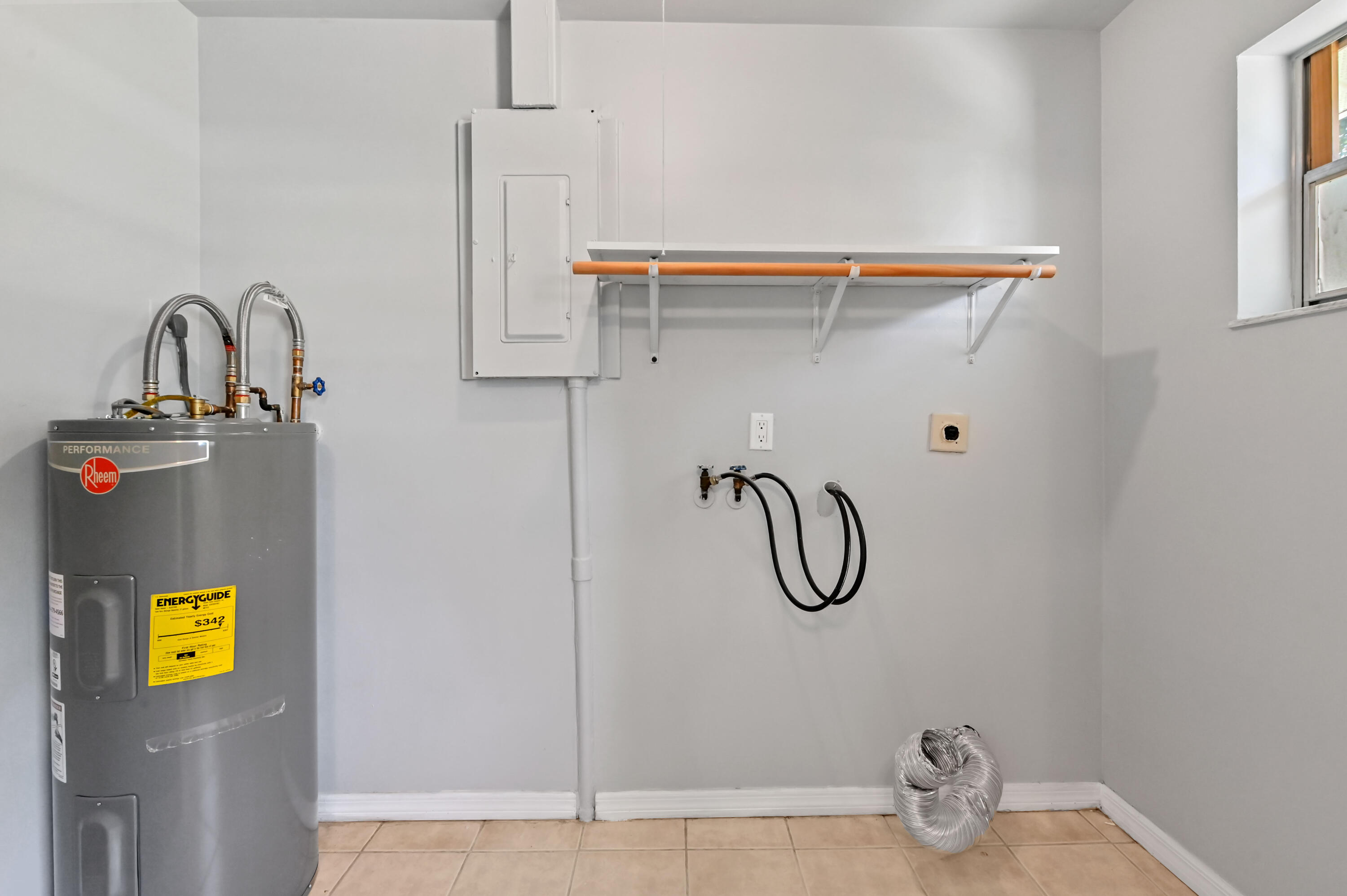 4550 Southeast Salvatori Road Stuart, FL 34997 - Photo 19 of 22 11 Laundry room 01
