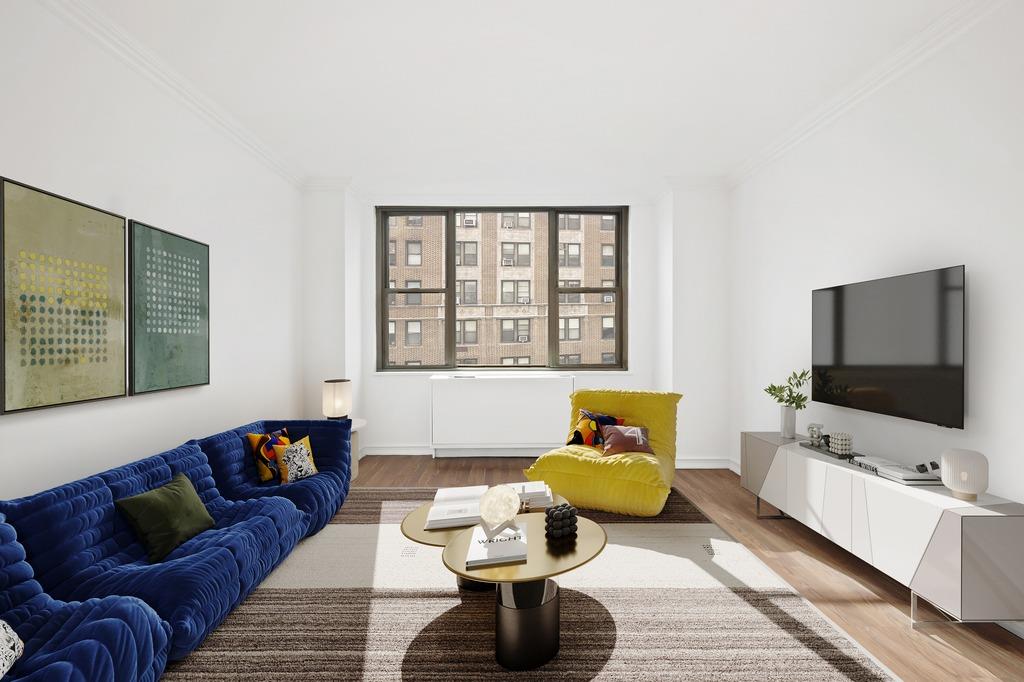 301 East 79th Street, Unit 15M Manhattan, NY 10075 - Photo 2 of 8 a living room with furniture and a flat screen tv