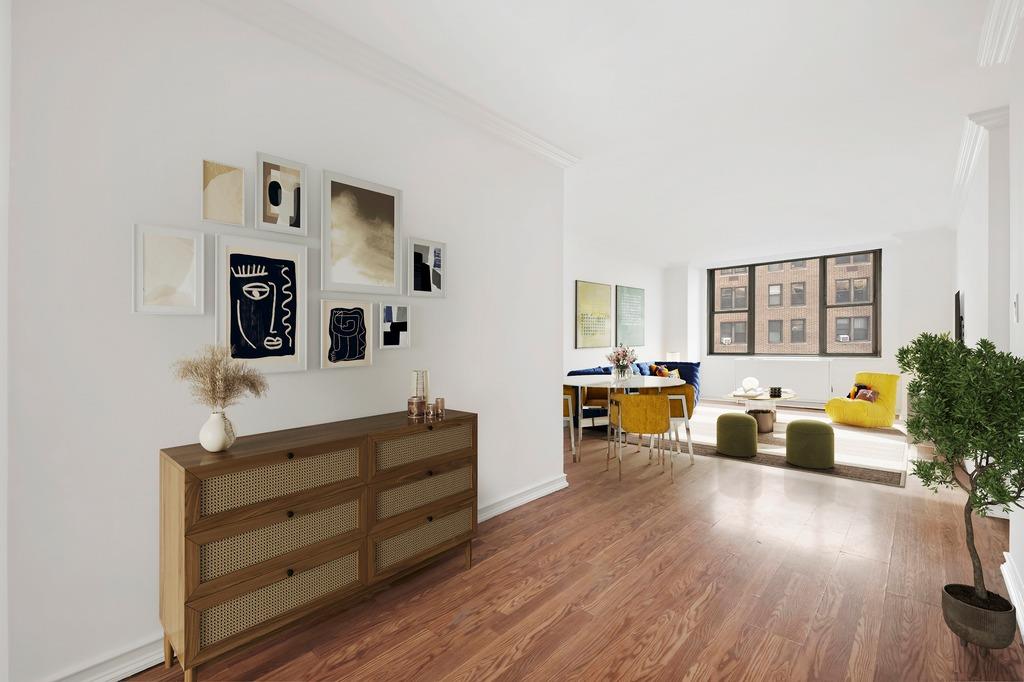 301 East 79th Street, Unit 15M Manhattan, NY 10075 - Photo 3 of 8 a living room with furniture and wooden floor