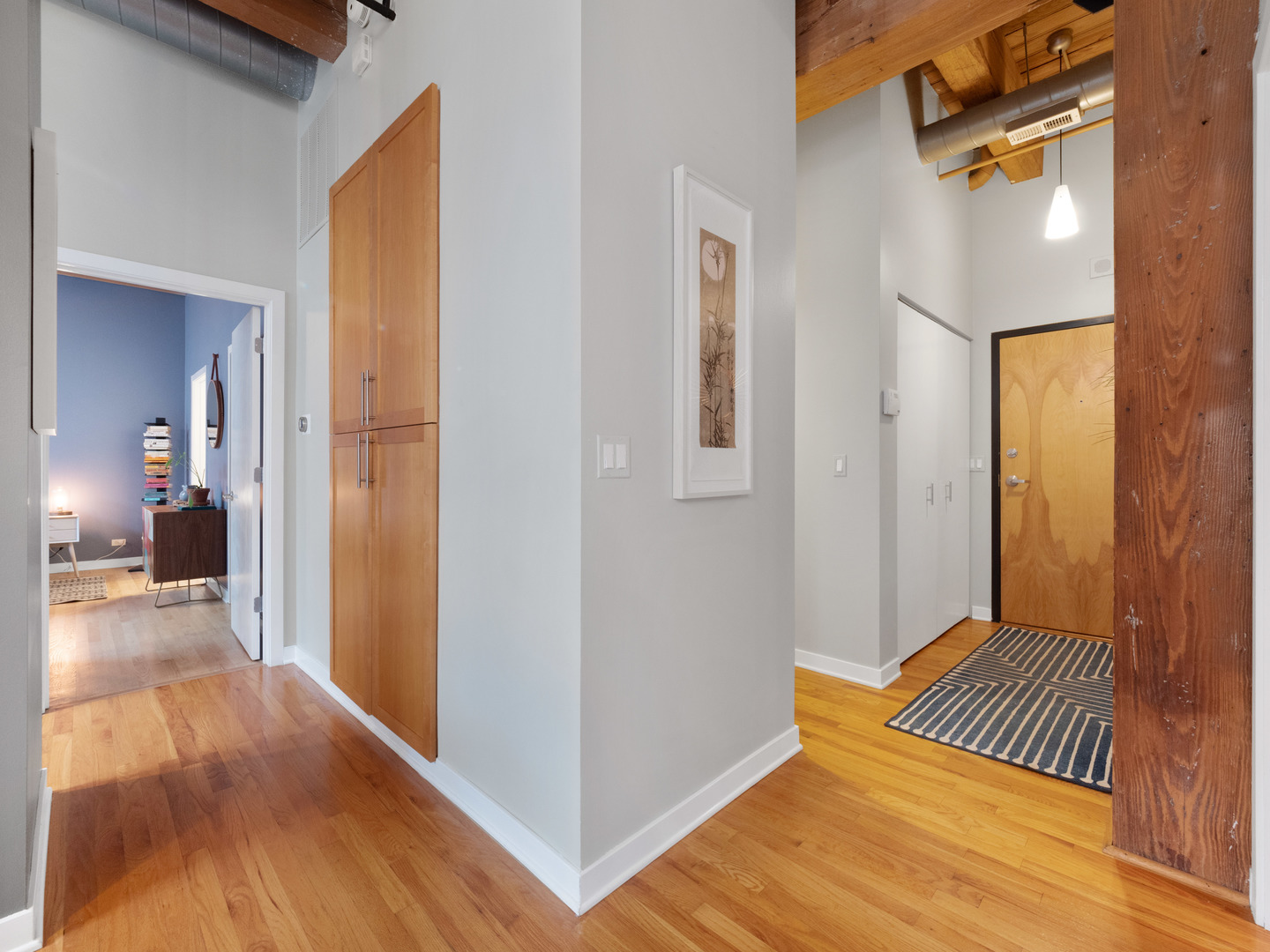 1750 North Wolcott Avenue, Unit 104 Chicago, IL 60622 - Photo 25 of 32 a view of a room with wooden floor