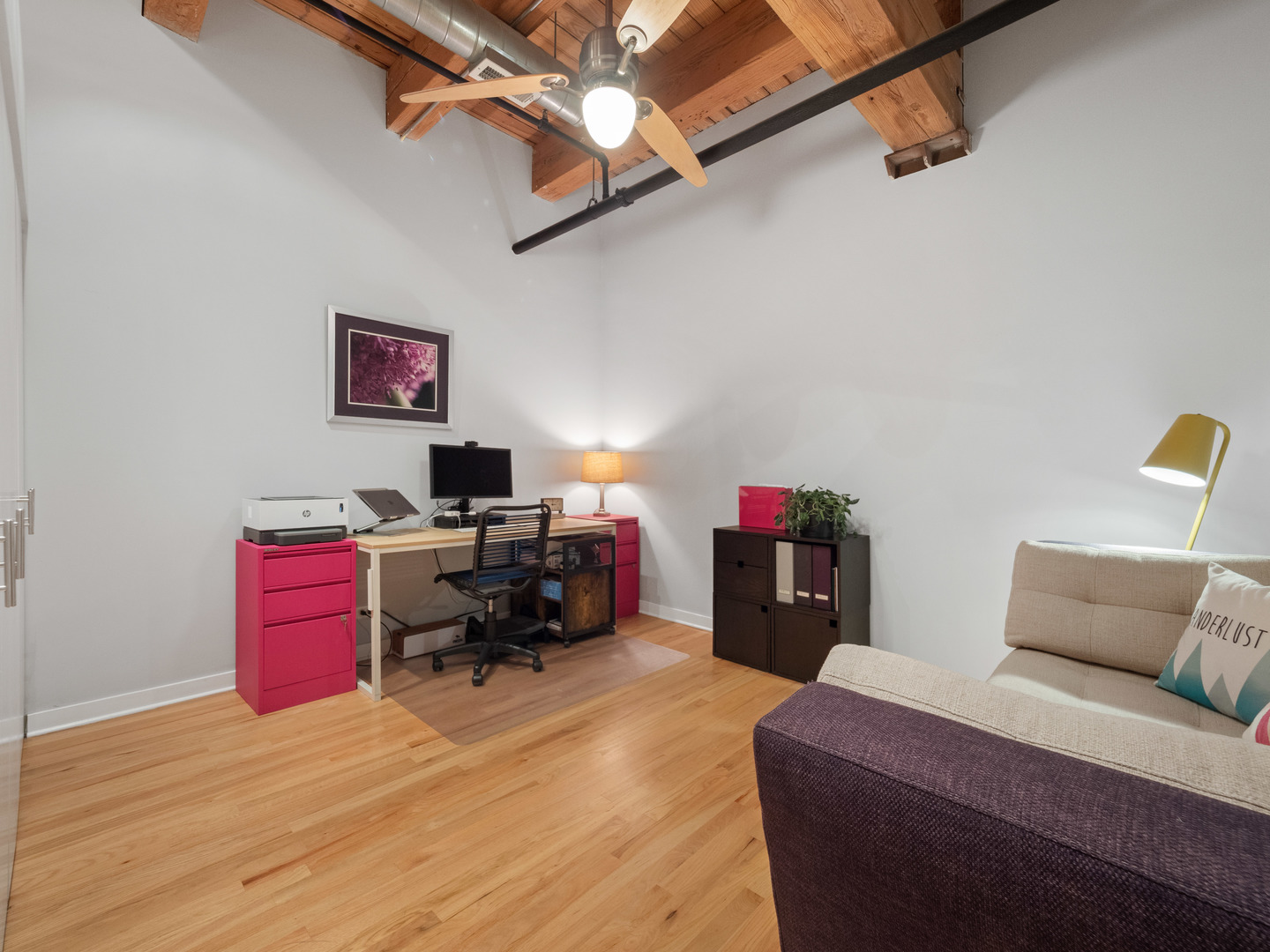 1750 North Wolcott Avenue, Unit 104 Chicago, IL 60622 - Photo 26 of 32 a bed room with a bed and a chair