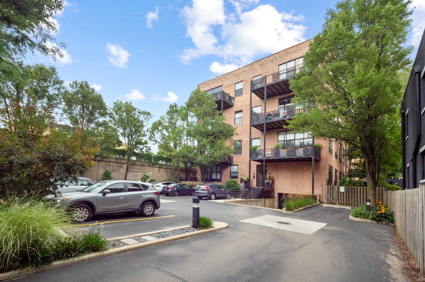 1750 North Wolcott Avenue, Unit 104 Chicago, IL 60622 - Photo 29 of 32 a view of a street with cars