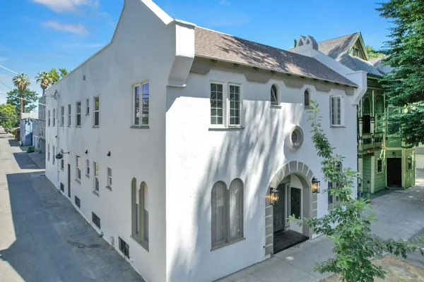 a front view of a house with balcony