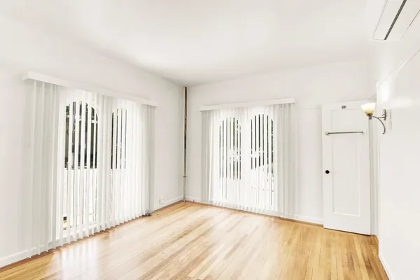 a view of a livingroom with wooden floor