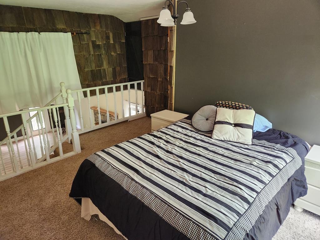 1939 Hodgetown Road Rutledge, TN 37861 - Photo 30 of 63 a bedroom with a bed and a window