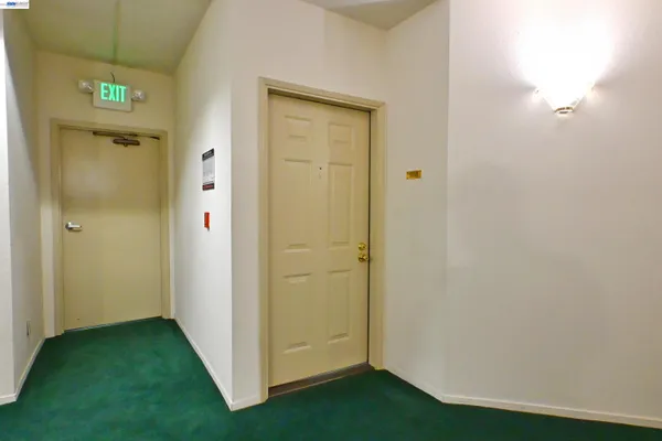 a view of an entryway with hallway