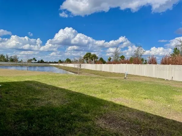 a view of an swimming pool and outdoor space