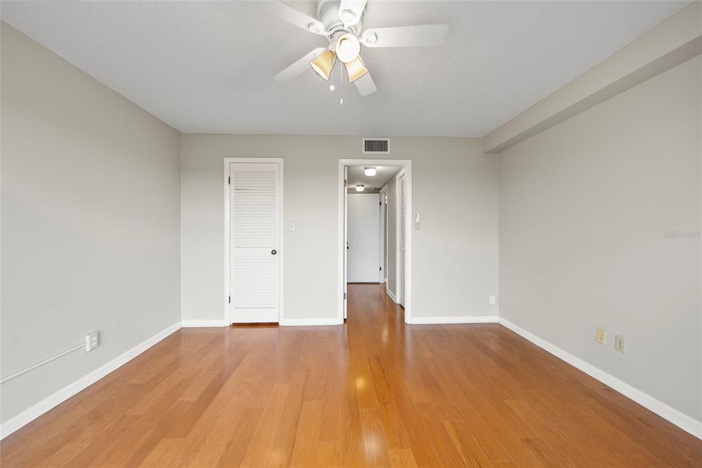 2611 Bayshore Boulevard, Unit 504 Tampa, FL 33629 - Photo 21 of 39 wooden floor in an empty room with a window