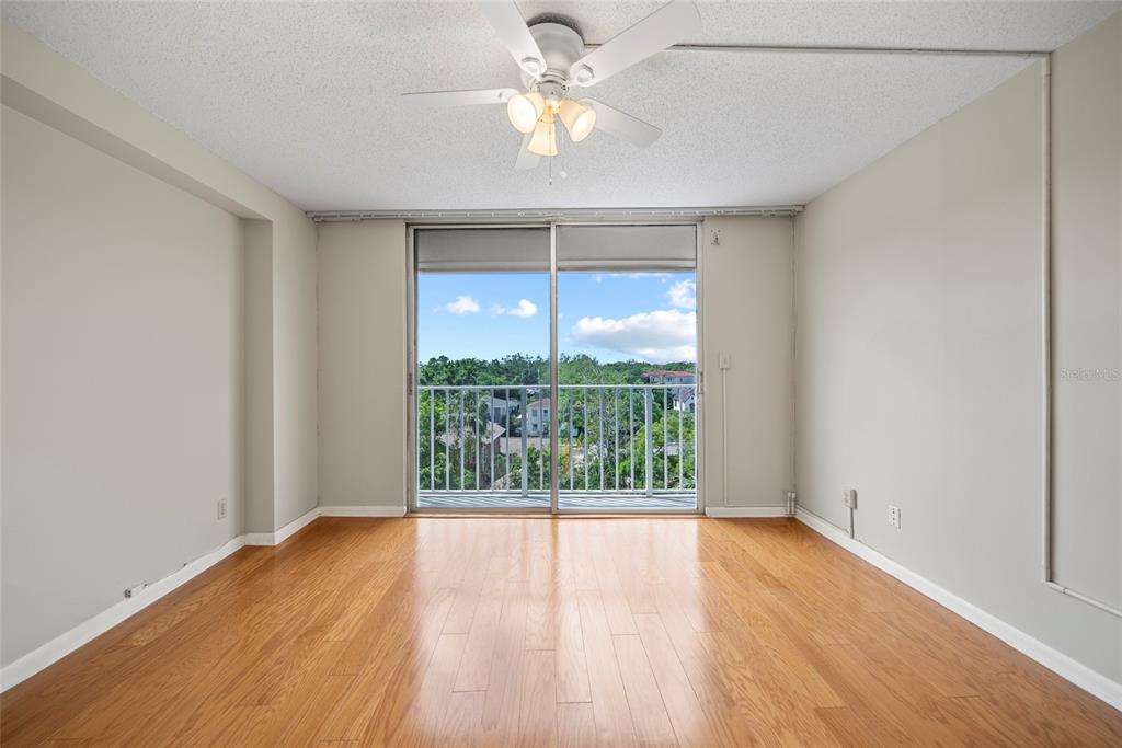 2611 Bayshore Boulevard, Unit 504 Tampa, FL 33629 - Photo 24 of 39 wooden floor in an empty room with a window