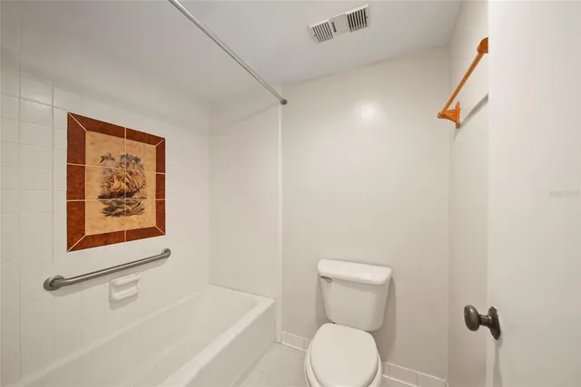 a view of a livingroom with wooden floor