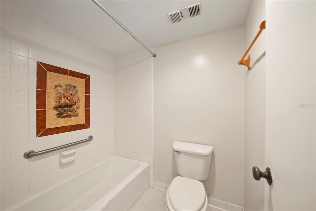 2611 Bayshore Boulevard, Unit 504 Tampa, FL 33629 - Photo 26 of 39 a bathroom with a toilet and a shower