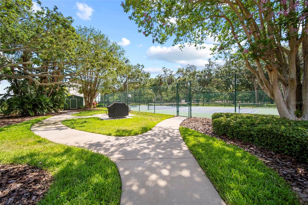 2611 Bayshore Boulevard, Unit 504 Tampa, FL 33629 - Photo 35 of 39 a view of a garden with swimming pool