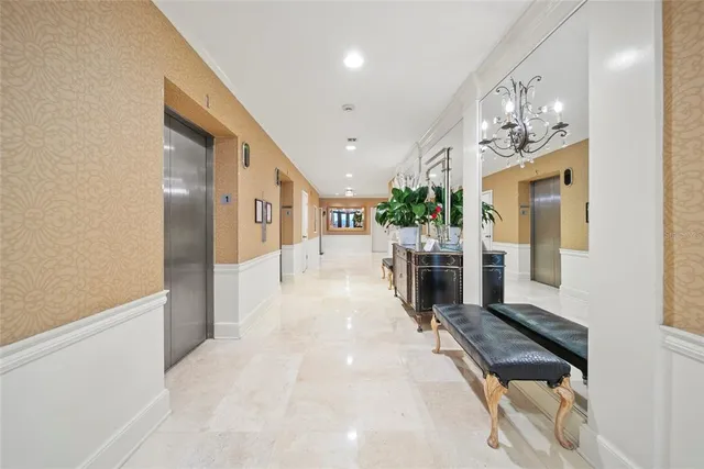 a view of a hallway with living room