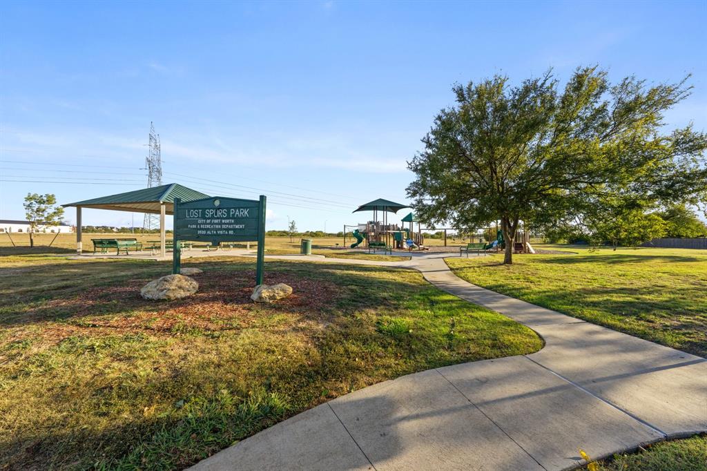 13604 Ponderosa Ranch Road Fort Worth, TX 76262 - Photo 11 of 27 a view of a street with houses