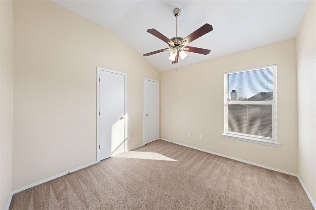 13604 Ponderosa Ranch Road Fort Worth, TX 76262 - Photo 16 of 27 an empty room with windows and fan