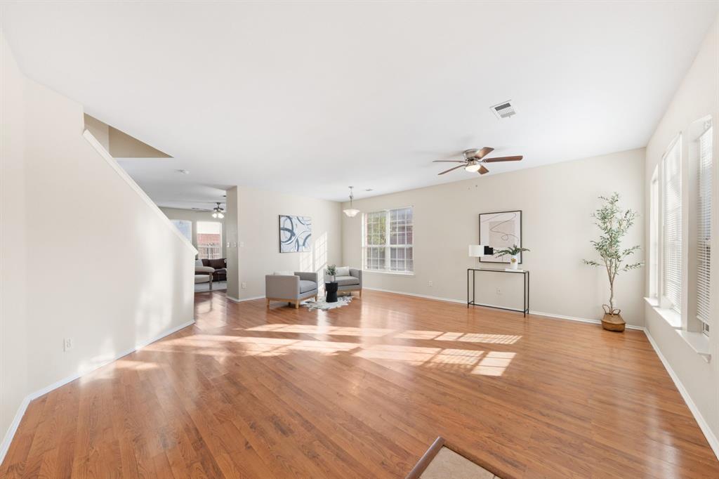 13604 Ponderosa Ranch Road Fort Worth, TX 76262 - Photo 3 of 27 a view of livingroom with hardwood floor and furniture