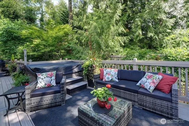 an aerial view of house with yard and outdoor seating