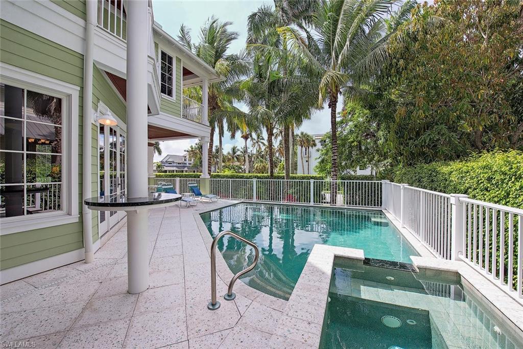 85 13th Avenue South Naples, FL 34102 - Photo 2 of 13 a view of balcony with furniture