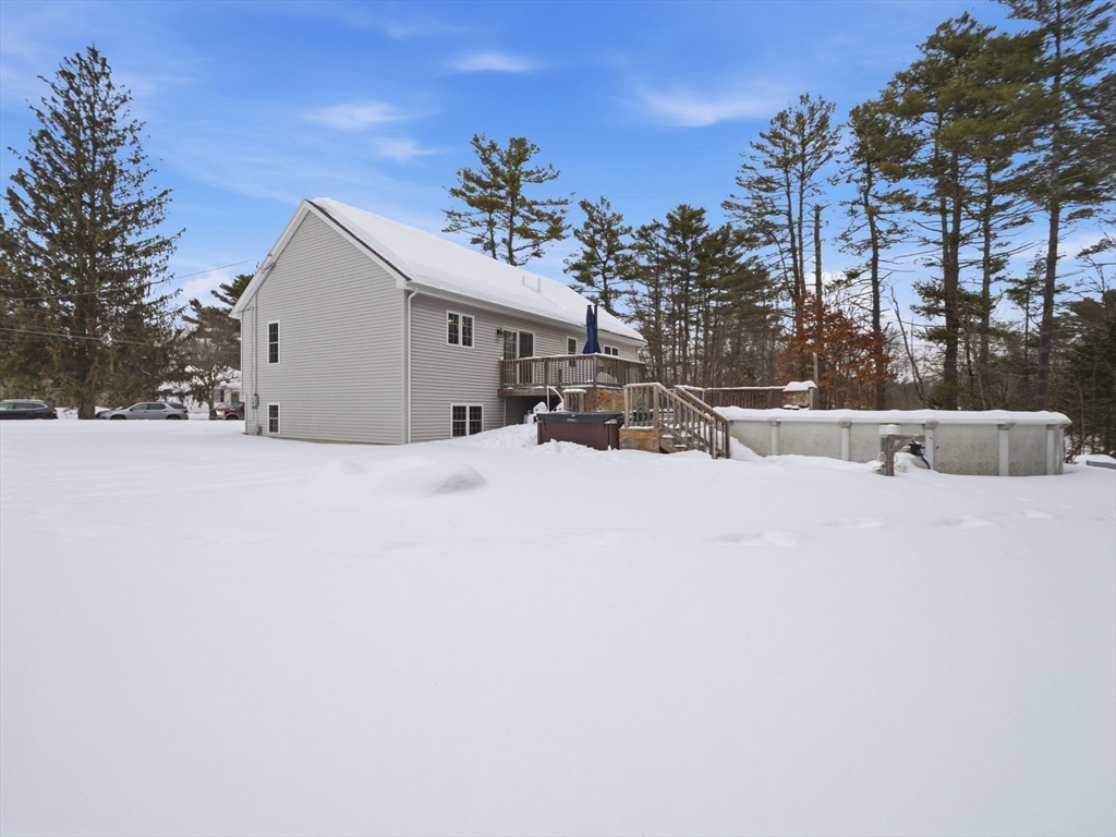661 Wheelwright Road Barre, MA 01005 - Photo 35 of 42 a view of the house with snow on the road