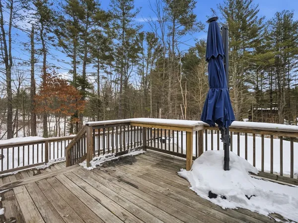a view of a wooden roof deck