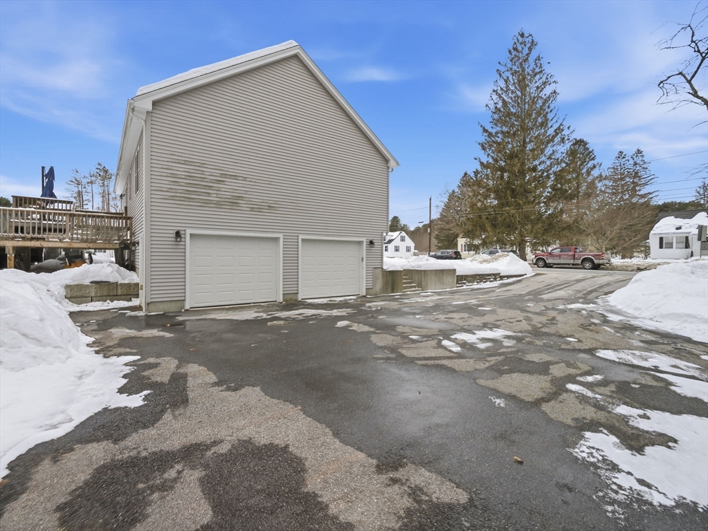 661 Wheelwright Road Barre, MA 01005 - Photo 41 of 42 a view of a house with a snow