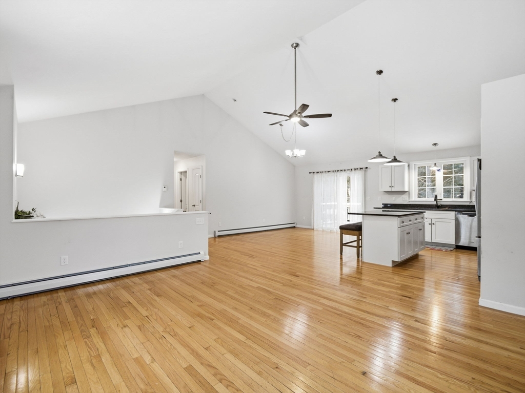661 Wheelwright Road Barre, MA 01005 - Photo 6 of 42 a view of kitchen with furniture and wooden floor