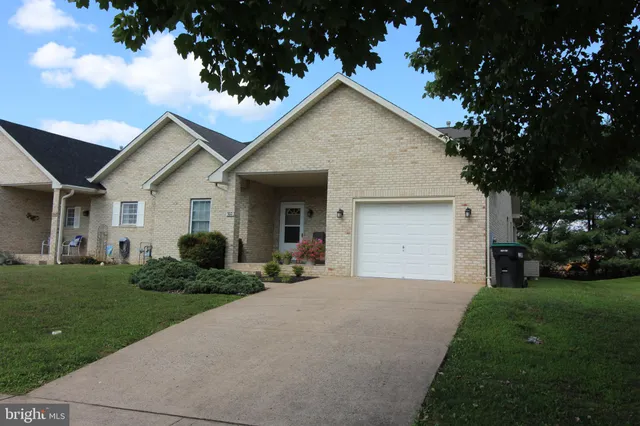 a house view with a garden space