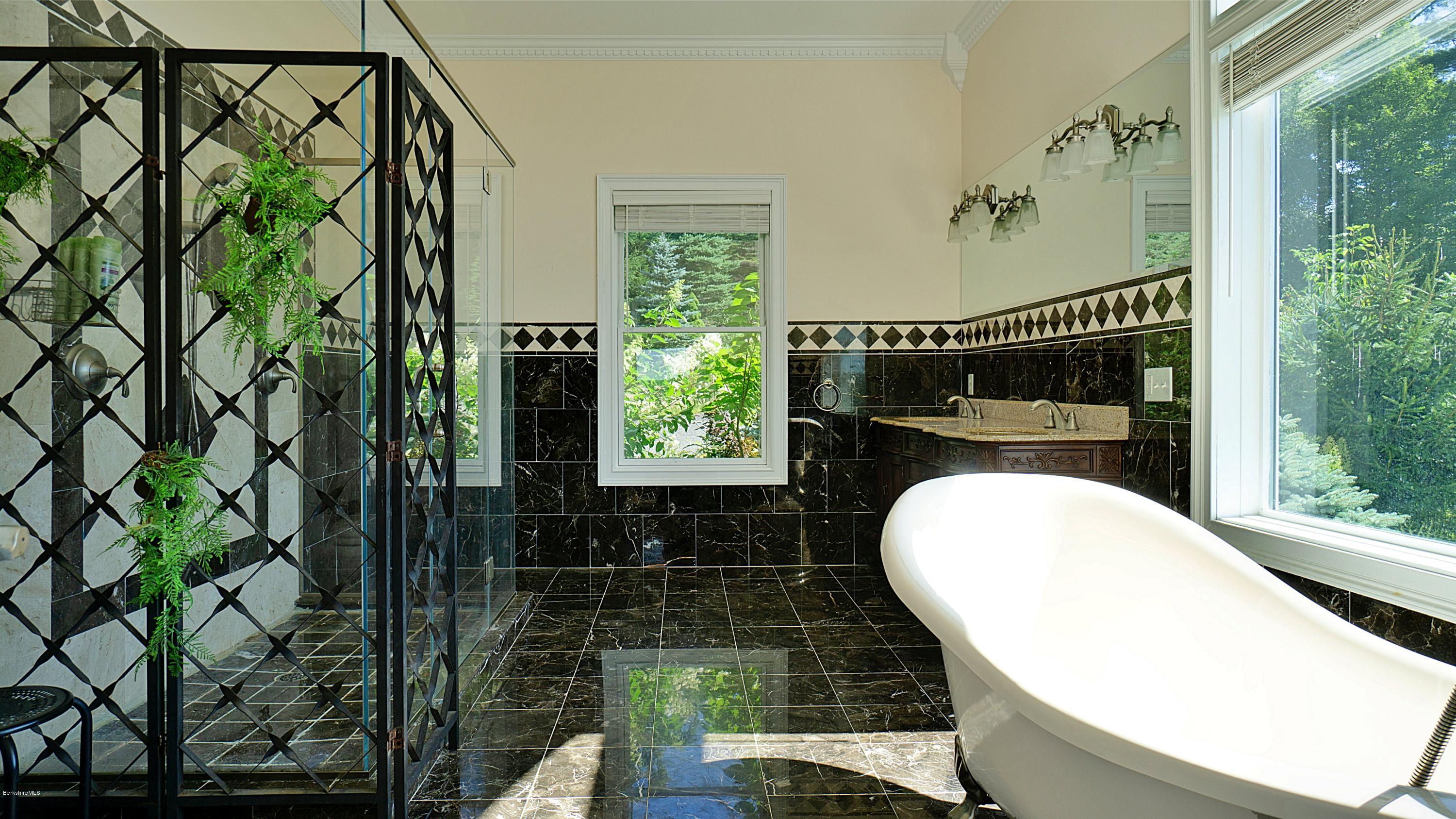 79 Hupi Road Monterey, MA 01245 - Photo 15 of 33 a bathroom with a bathtub and a shower