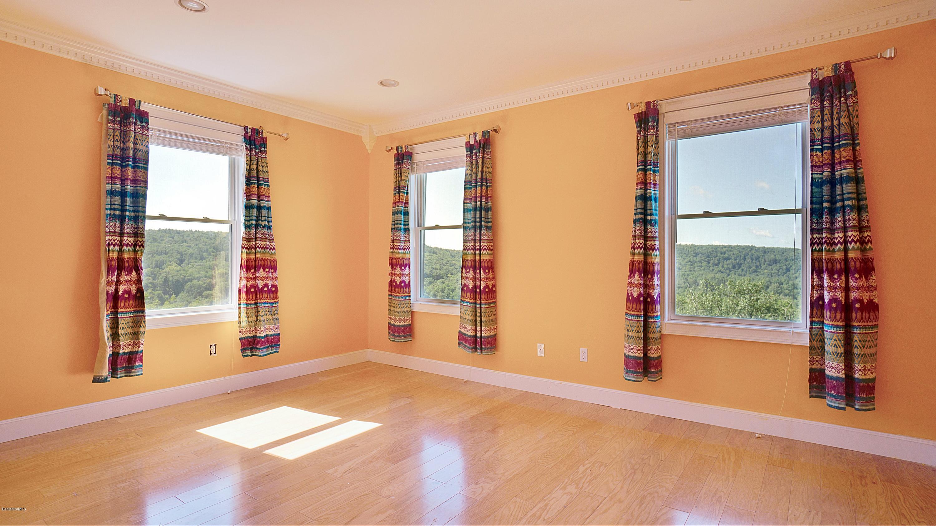 79 Hupi Road Monterey, MA 01245 - Photo 20 of 33 a view of a room with a large window