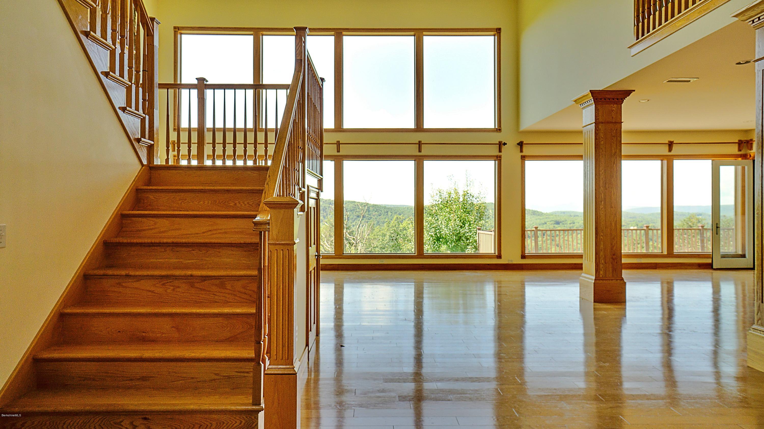79 Hupi Road Monterey, MA 01245 - Photo 6 of 33 a view of staircase with large window