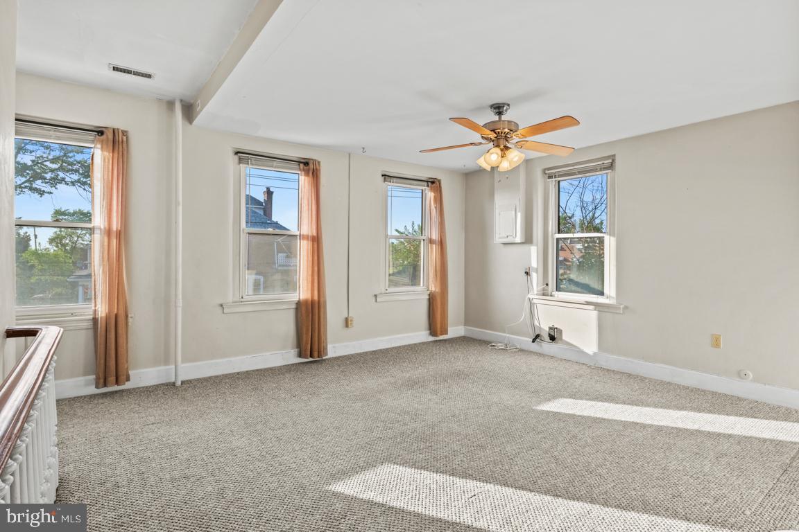 201 North Line Street Lansdale, PA 19446 - Photo 12 of 24 an empty room with windows and fan