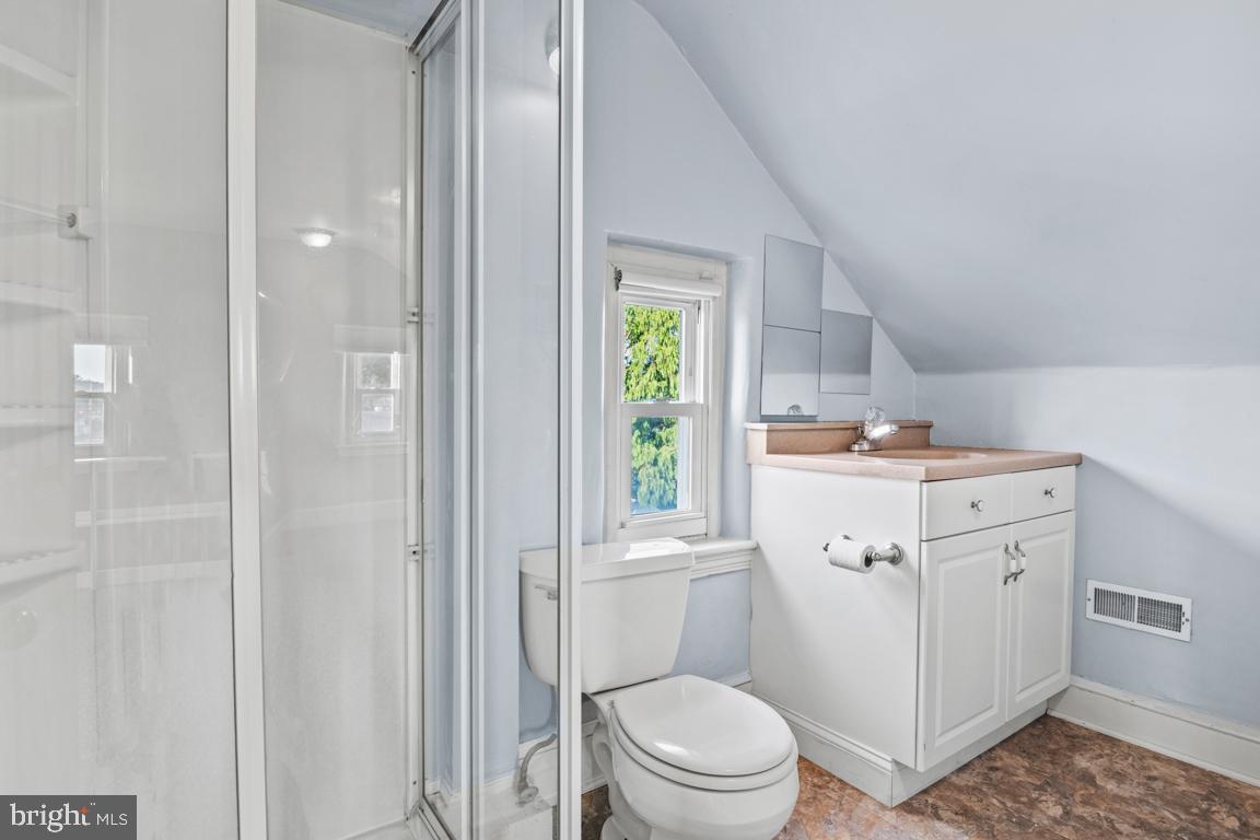 201 North Line Street Lansdale, PA 19446 - Photo 21 of 24 a bathroom with a sink a toilet and shower