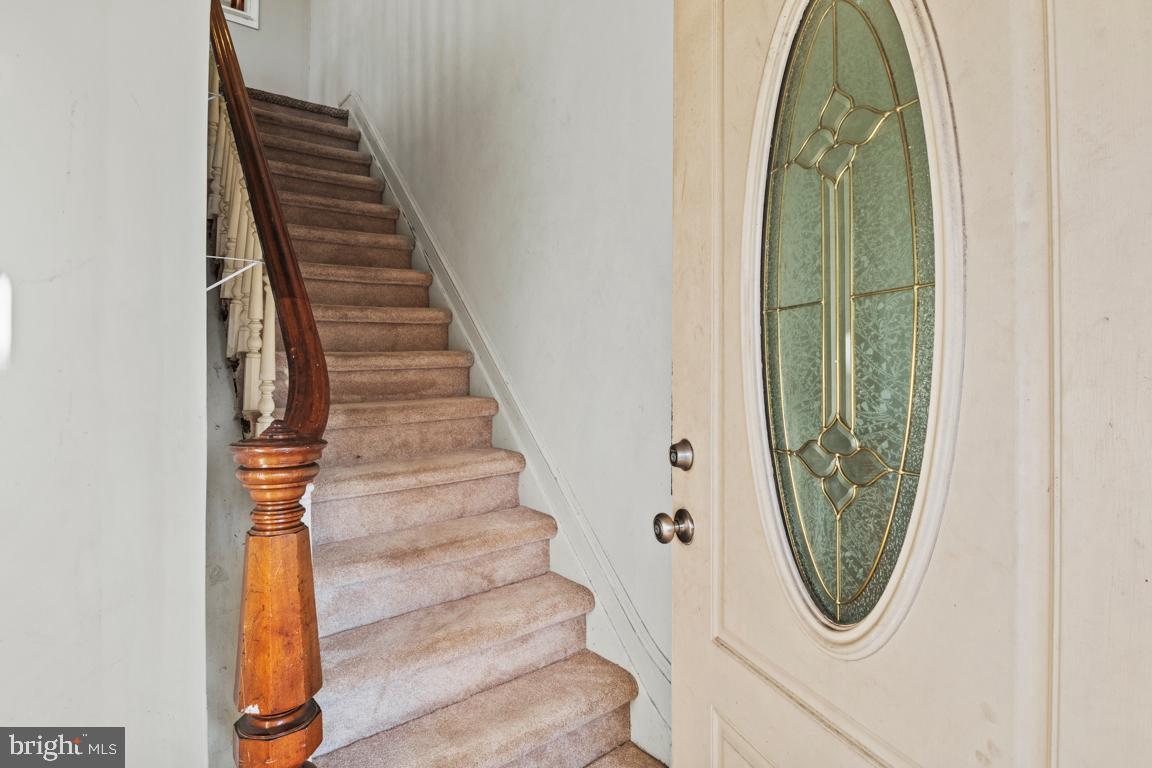 201 North Line Street Lansdale, PA 19446 - Photo 5 of 24 a view of a hallway with wooden floor and entryway