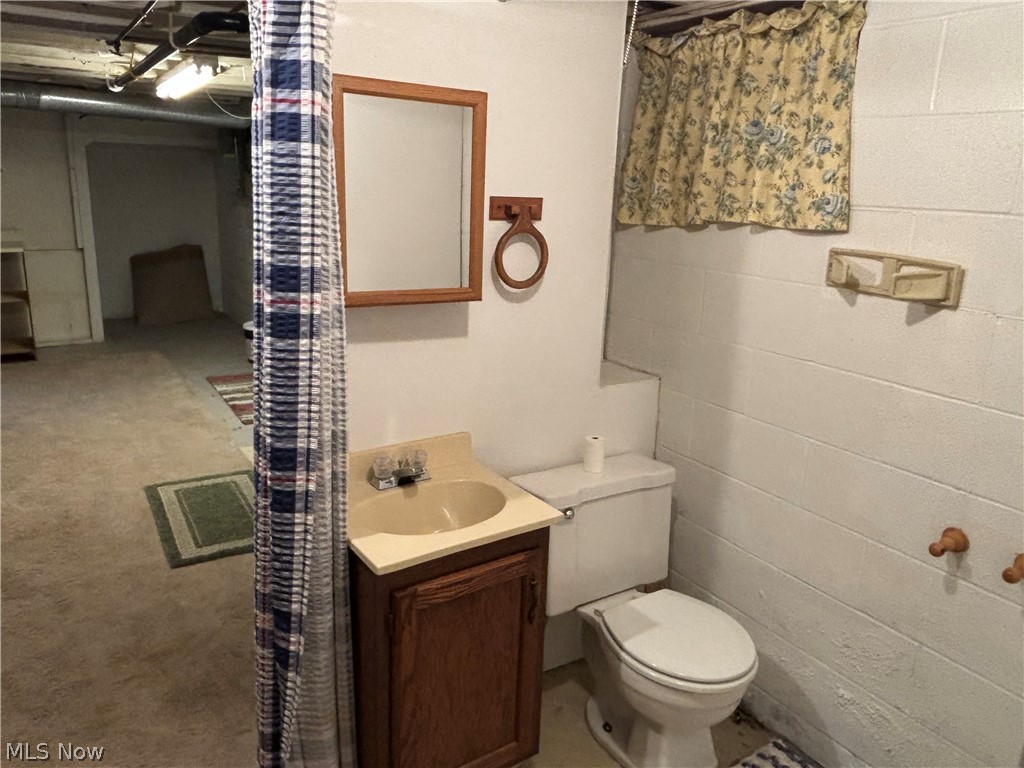 2421 Burbank Road Wooster, OH 44691 - Photo 20 of 23 Half Bathroom featuring vanity and toilet