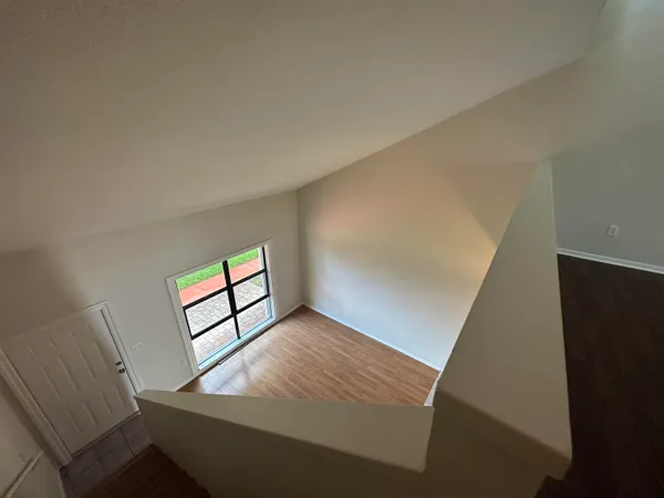 a view of an empty room and window