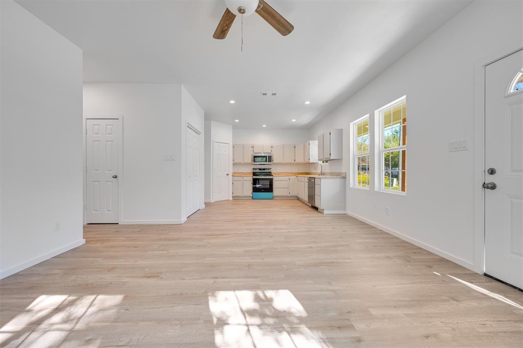 540 Southeast 2nd Street Cooper, TX 75432 - Photo 12 of 30 a view of kitchen and refrigerator