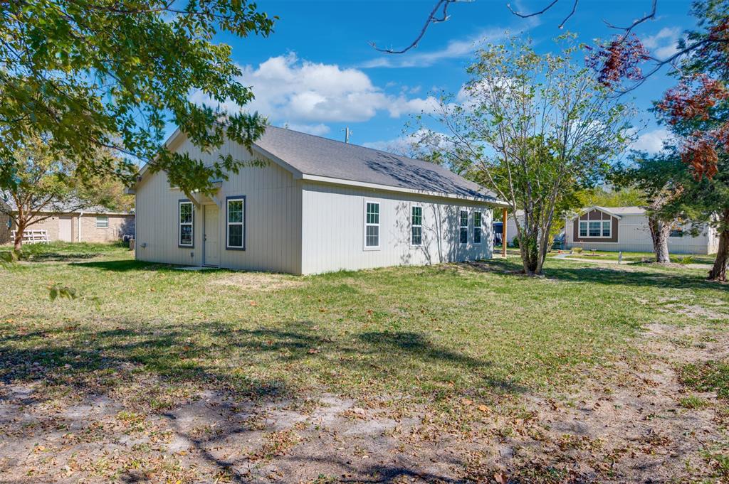 540 Southeast 2nd Street Cooper, TX 75432 - Photo 27 of 30 a house view with a garden space