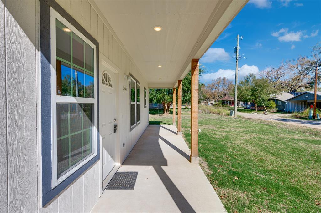 540 Southeast 2nd Street Cooper, TX 75432 - Photo 5 of 30 a view of a house with a porch